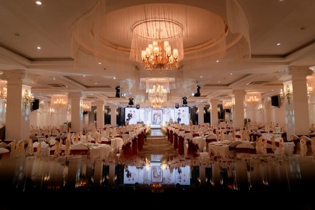 pexels photo 30311728 30311728 1 Luxurious ballroom beautifully arranged for a grand evening event, with chandeliers illuminating the decor.