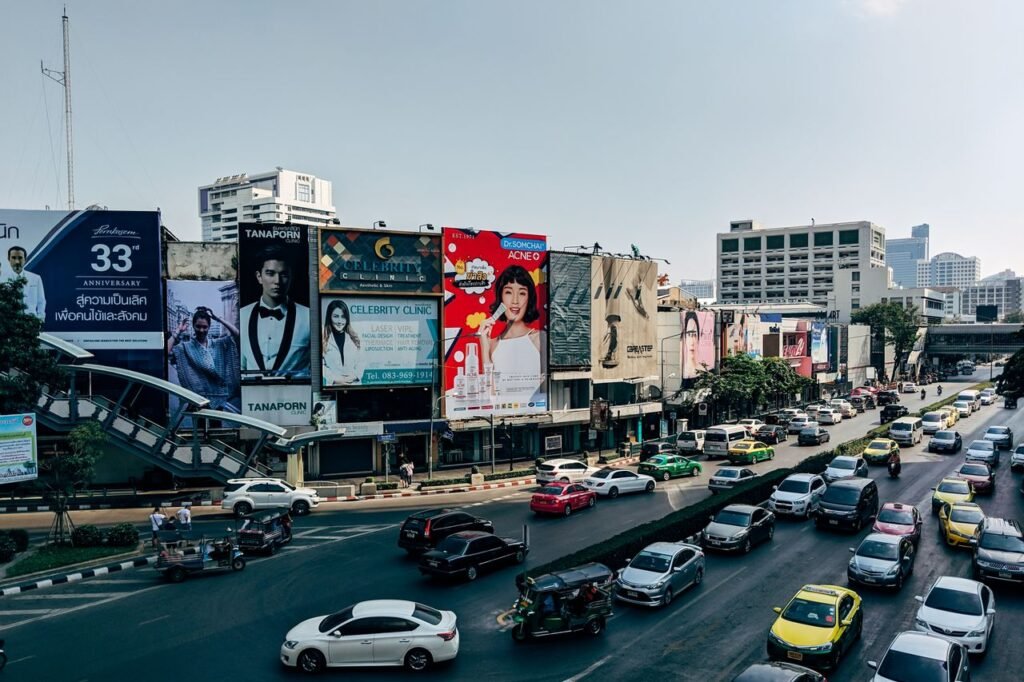 pexels photo 5102100 5102100 Dynamic cityscape of Bangkok showcasing heavy traffic and colorful billboards in the metropolis.